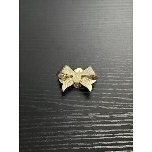 Vintage 80's Brass-Toned Metal Bow Clip-On Brooch Repousse Rose Floral Pattern